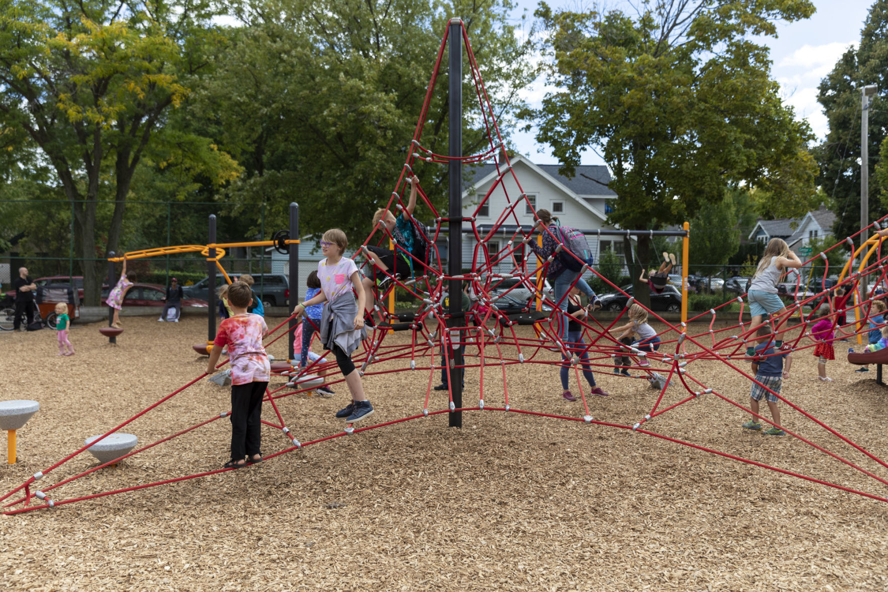 Children explore the new playground at Lowell Elementary School